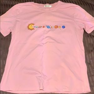 Large solar system shirt, fits like a medium.